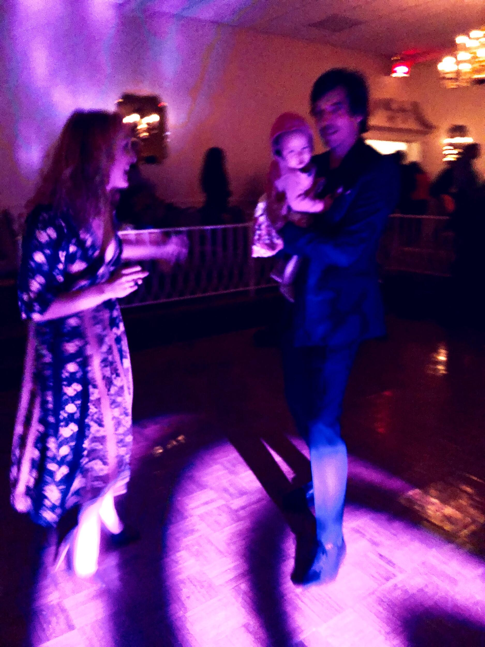 We were first on the the dance floor, celebrating family accomplishments. Thanks to Duckia and Ryan, holding one of theirs.