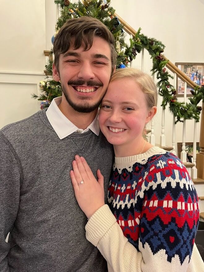 Blaise proposed at the St. Elizabeth Ann Seton's Adoration chapel on Christmas Day! 