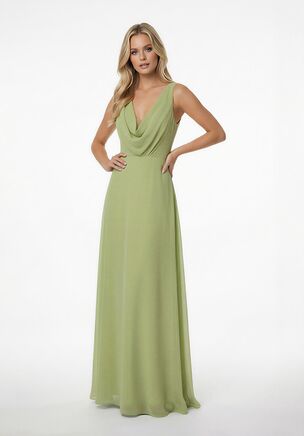 Turn heads from aisle to dance floor in this effortlessly elegant bridesmaid dress. Crafted from airy Poly Chiffon with a soft Stretch Lining, this gown moves beautifully with every step. The flattering A-line silhouette flows gracefully, while the draped cowl neckline adds a fresh, romantic touch. A sleek V-back brings just the right hint of drama, making this dress both modern and timeless. Light, comfortable, and undeniably chic, it’s the perfect choice for a bridal party that wants to look polished while feeling amazing.