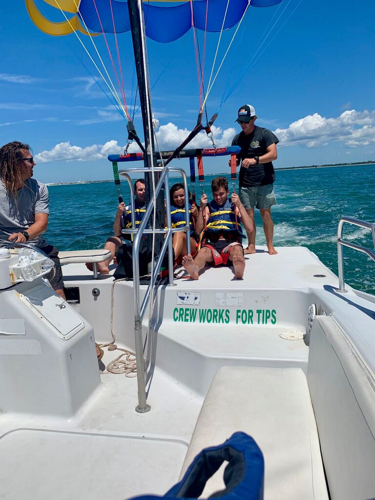 The Rines family invited Zoey on their annual vacation to Emerald Isle, SC. Jesse, Zoey, and Zach went parasailing! 