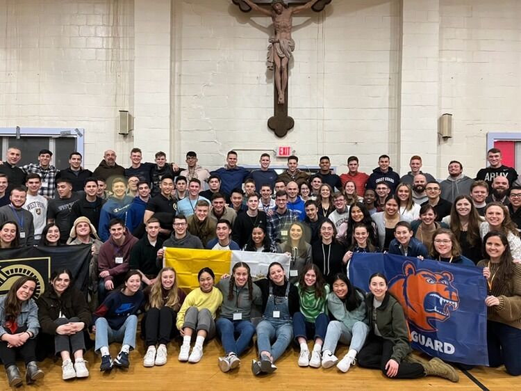 Katie and Mark ran into each other at Catholic ministry events a few times their plebe year. Mark caught Katie's eye at the SEEK retreat during February of their plebe year, but they hardly spoke to each other. Her crush lasted into plebe history class all of second semester.