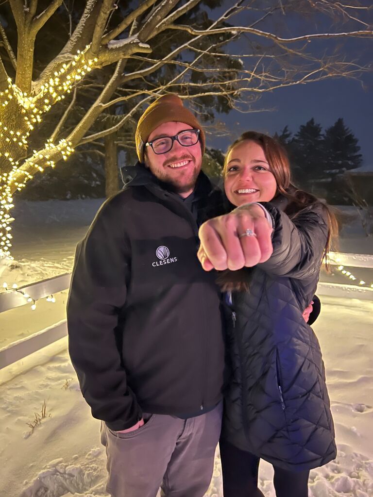 We got engaged! Isaac proposed in the backyard of our new house during one of the many snowstorms. He set up a bunch of Christmas lights (with help) and Rusty was even there with us :)