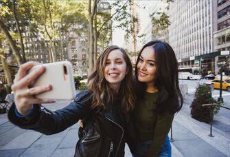 bachelorette party NYC - two women taking selfie 