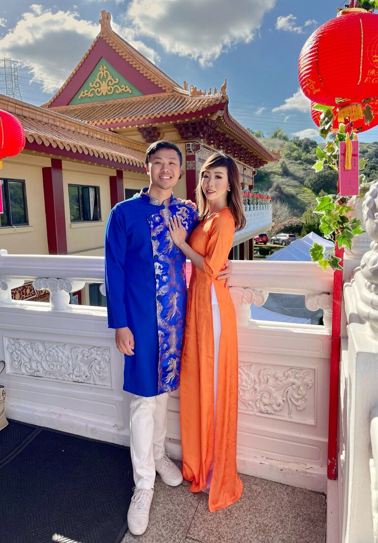 Cindy culturing Daniel into wearing his ao dai every Chinese New Year