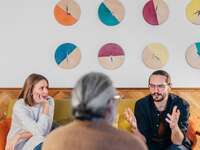 Couple talking to a premarital counselor