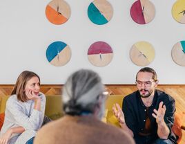 Couple talking to a premarital counselor