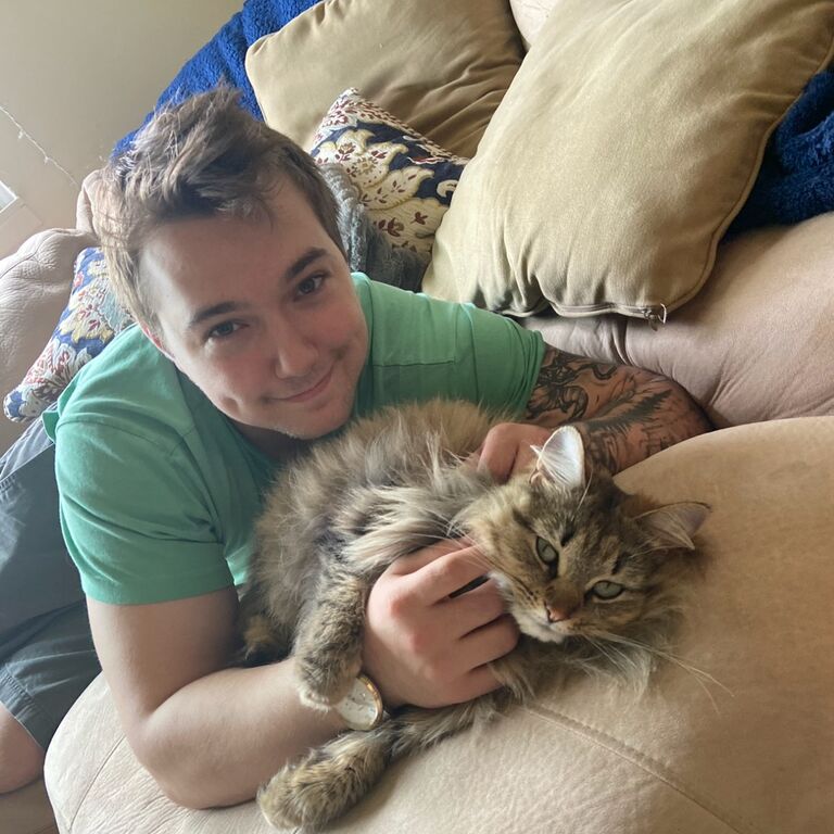We got our first pet together, Samantha. We adopted her from Ethan's Nana who rescued her!