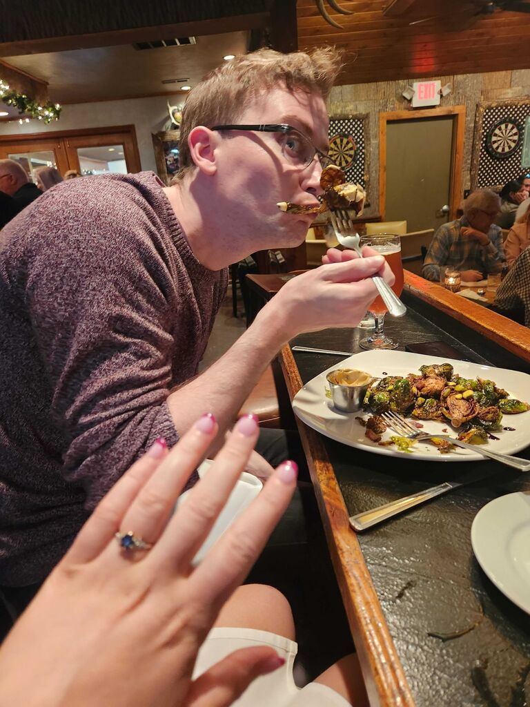 Enjoying a scrumptious dinner after getting engaged.
