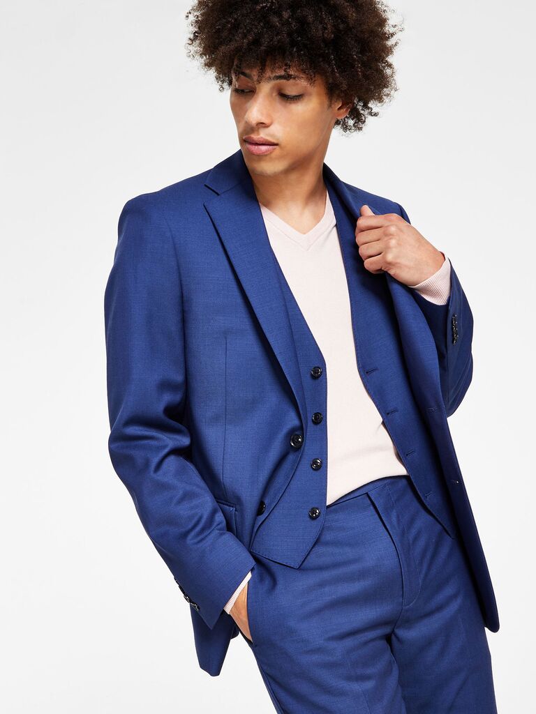 Calvin Klein bright blue suit for cocktail wedding attire