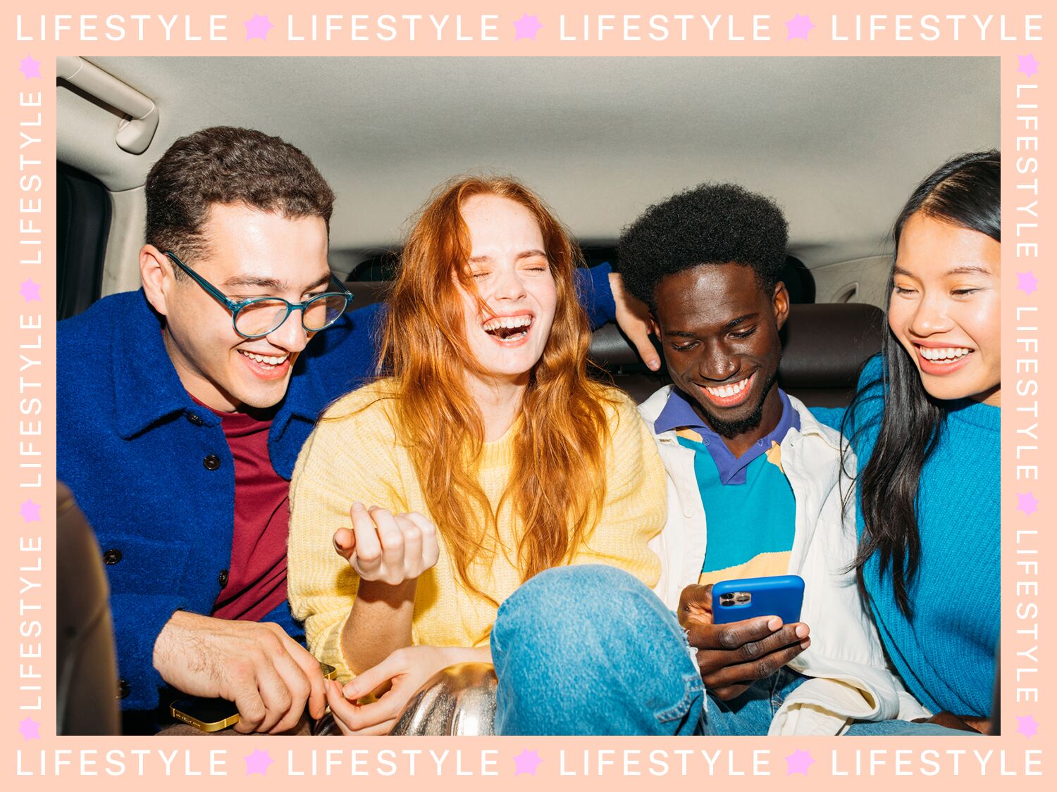 Friends laughing together in car