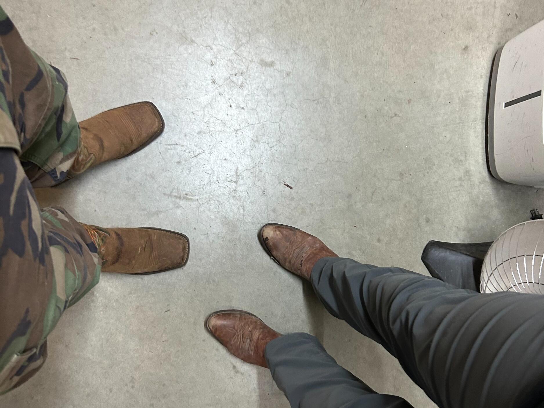 First Picture Together - Erikah insisted on taking a picture of thier matching cowboy boots before they went on tour. 