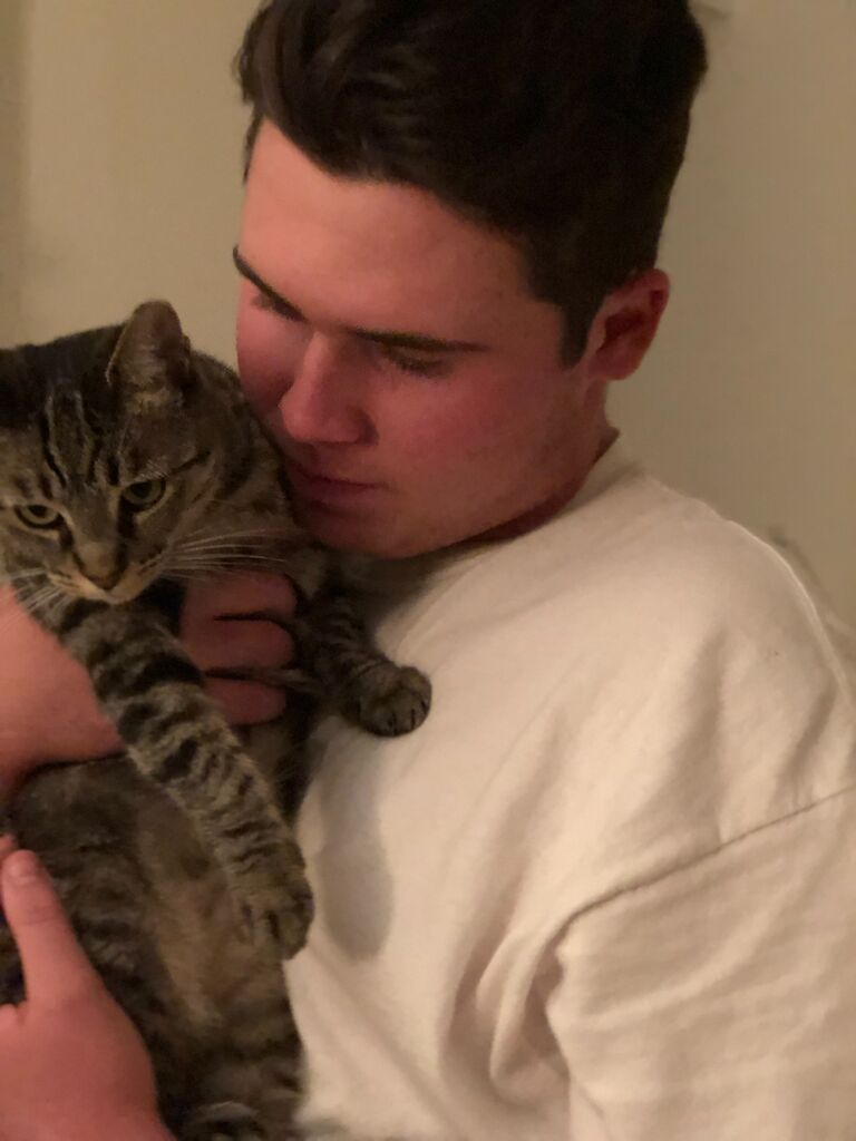 Mariah adopted Gracie and Zak quickly became an amazing cat dad.