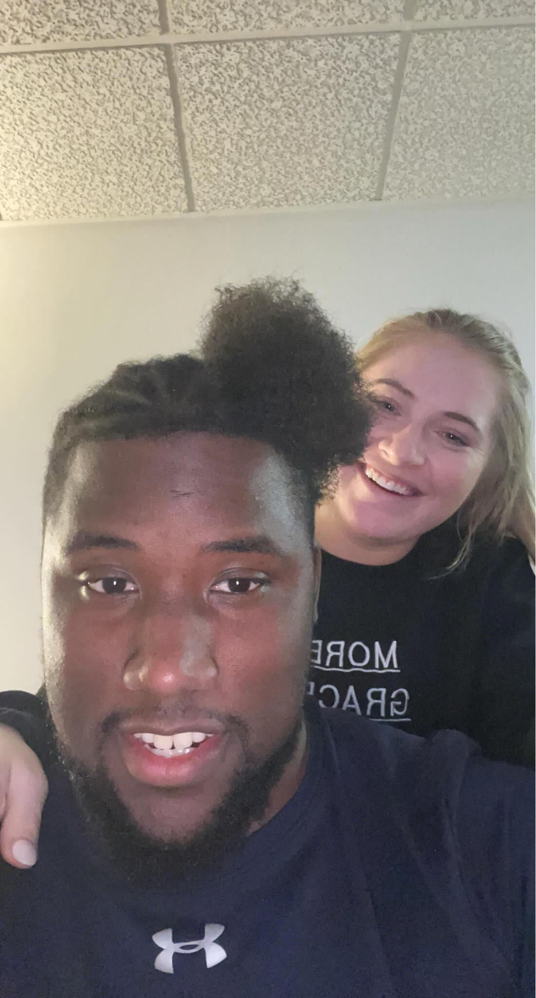 Sam's first time braiding Thomas's hair.