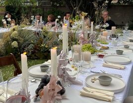 Pastel bow candle centerpiece at wedding