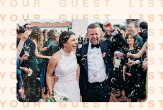 Couple at wedding surrounded by guests throwing confetti