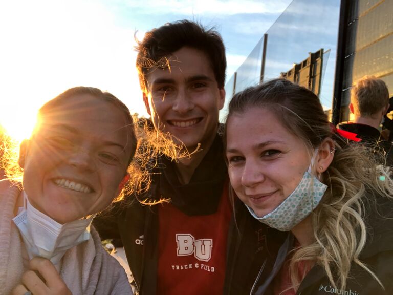 Living our best lives at a track meet as teammates.