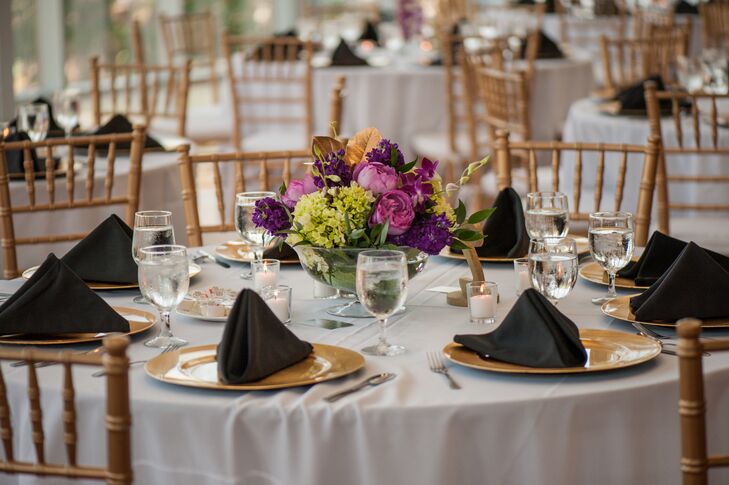 Gold Plates And Black Linen Napkins