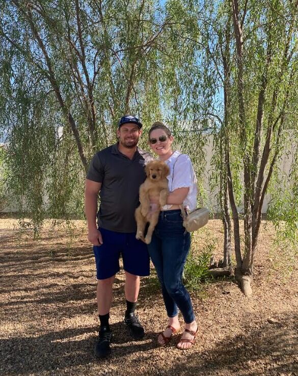 Luke and Kelly bring home their golden retriever puppy, Pete - expanding the family together!