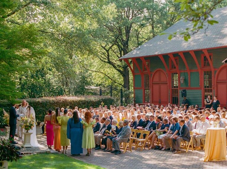 Outdoor ceremony beside The Trolley Barn venue