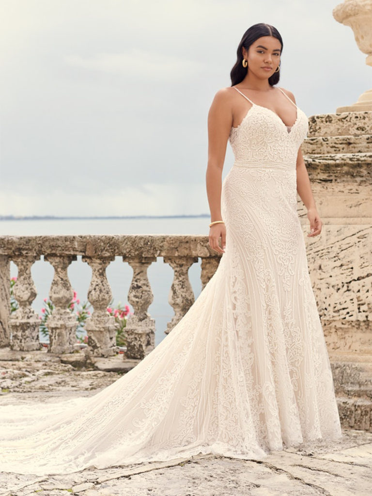 Gown with intricate beading and spaghetti straps