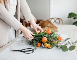 Woman creating wedding bouquet