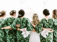 Bride with bridesmaids after getting hair done