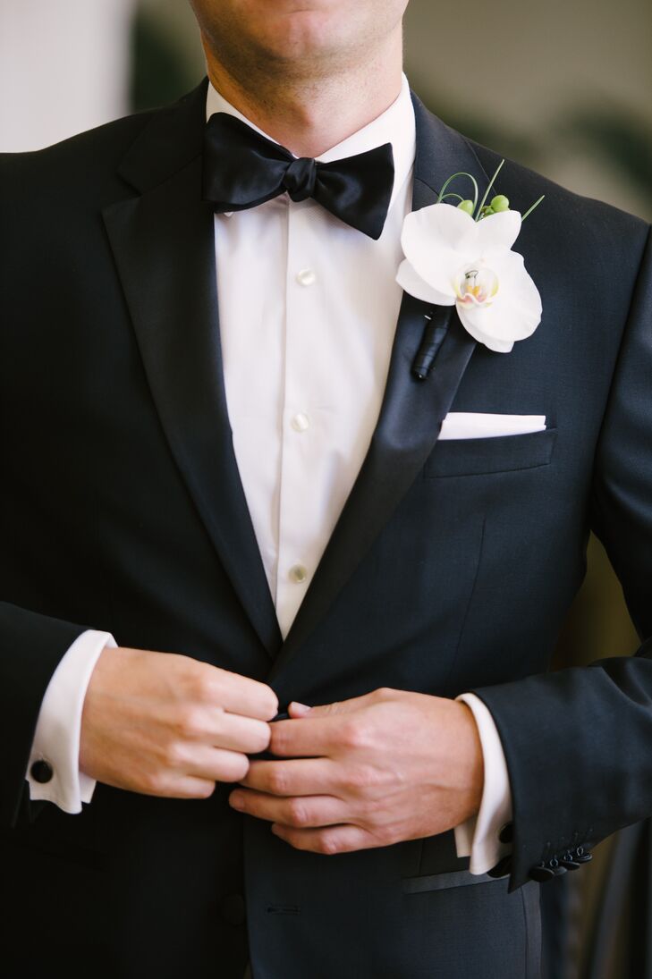 Classic Groom’s Tuxedo with White Orchid Boutonniere