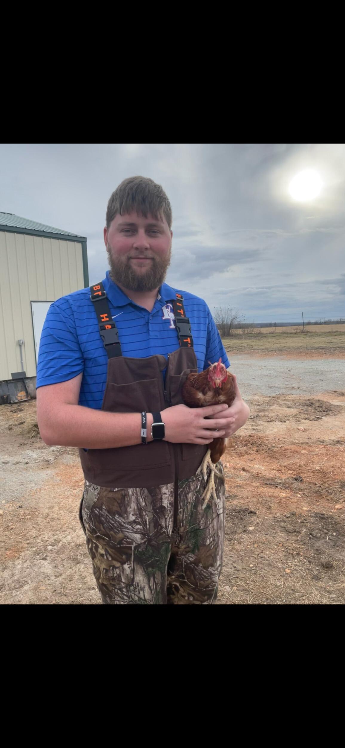 My chicken farmer. This chicken follows him around every time we go out to do chores. I can't say I blame her I would follow him too. 😂