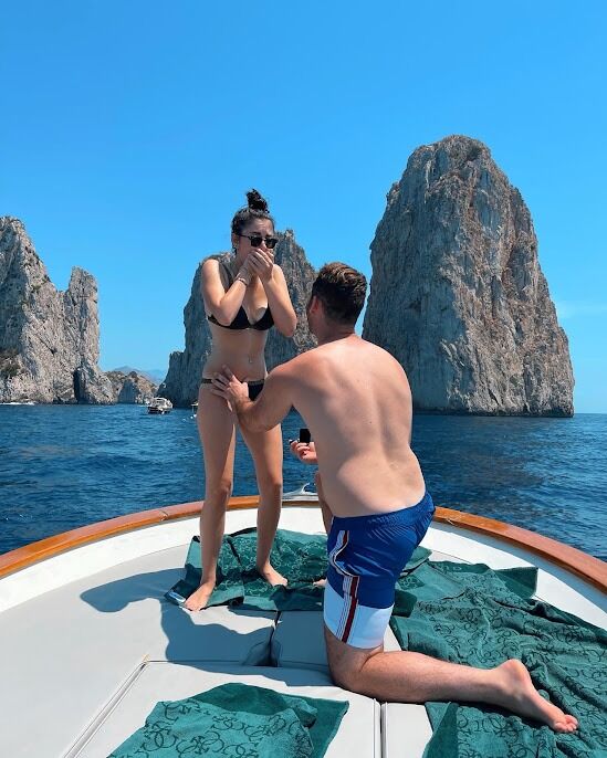 Josh proposes to Laura on a boat in Capri, Italy!