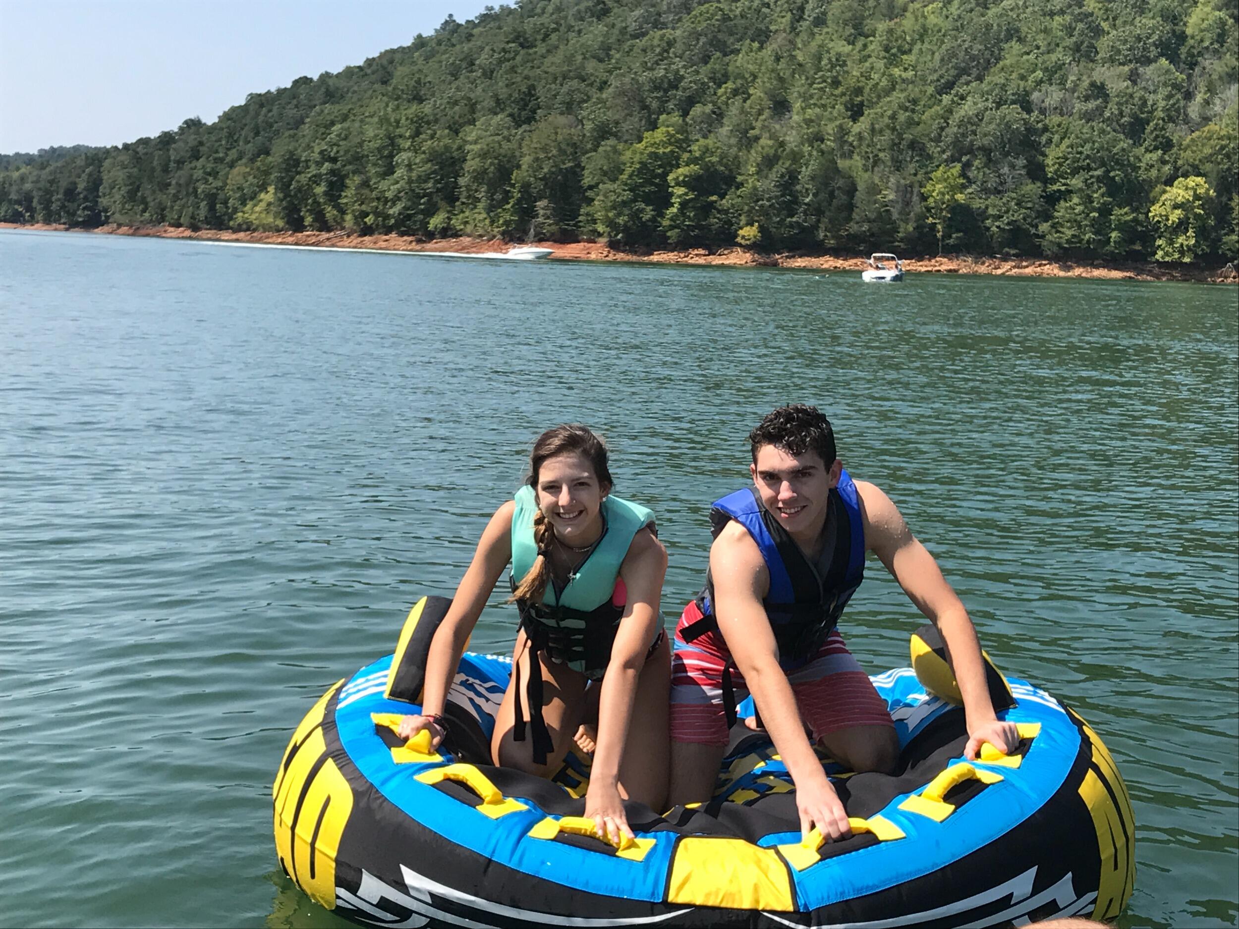 Our first trip to the lake together! Shan swears its Austin's fault she fell off the tube shortly after this moment. He'll never admit it!