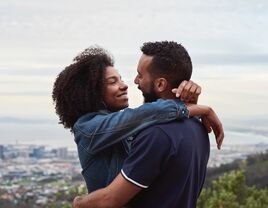 Couple hugging each other.