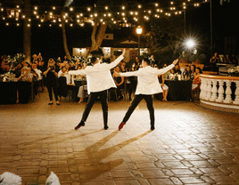 A couple dances to their favorite song. 