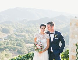 Bride and groom with California mountains behind them