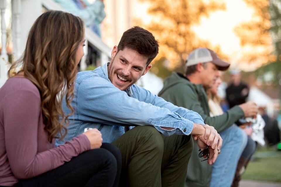 Paige and Jordan's first date! They met for the first time at an outdoor music festival in Texas and  spent hours talking and laughing. Paige thought Jordan was funny and blushed at his cheesy mustache. Jordan thought Paige was cute, even though she showed up late (oops!)