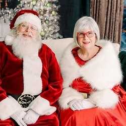 Santa Phil, Mrs Claus and their Magic Tesla, profile image