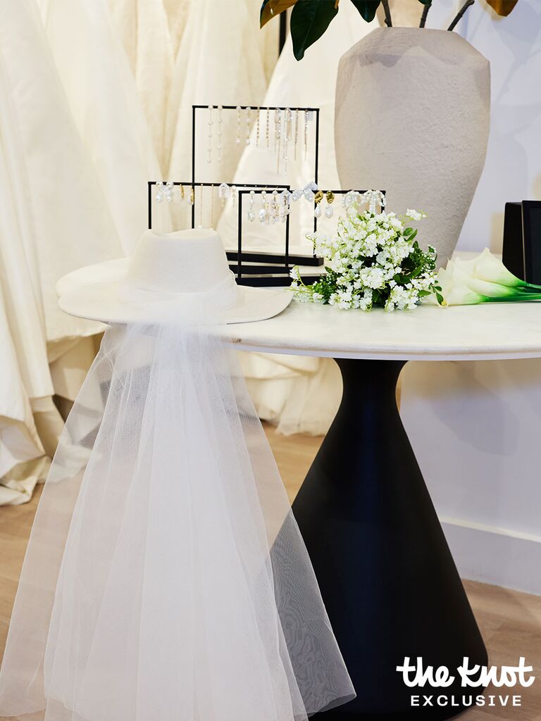 Bridal top hat with veil at Jenny Yoo