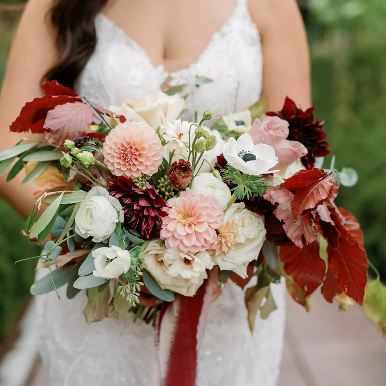 Autumn-inspired wedding bouquet in wine and pink tones