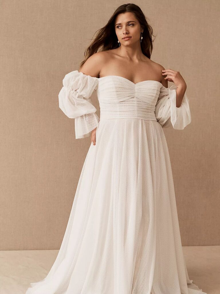 Off the should white wedding dress by Anthropologie. 