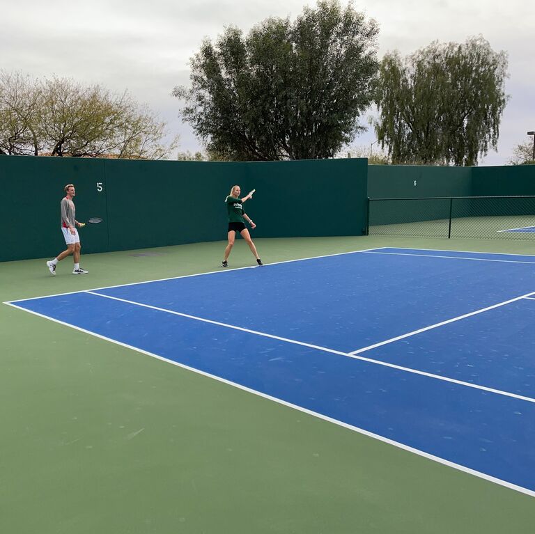 Hannah and Reuben playing tennis in Oro Valley with Bruce. Meg is our amazing photographer!