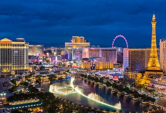 bachelor party vegas - scene of the strip and the bellagio fountain at night