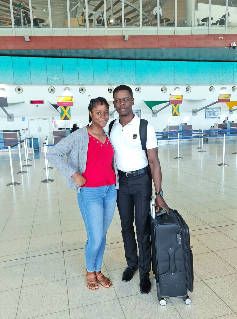 Norman Manley International Airport. A bitter sweet moment for the couple. 