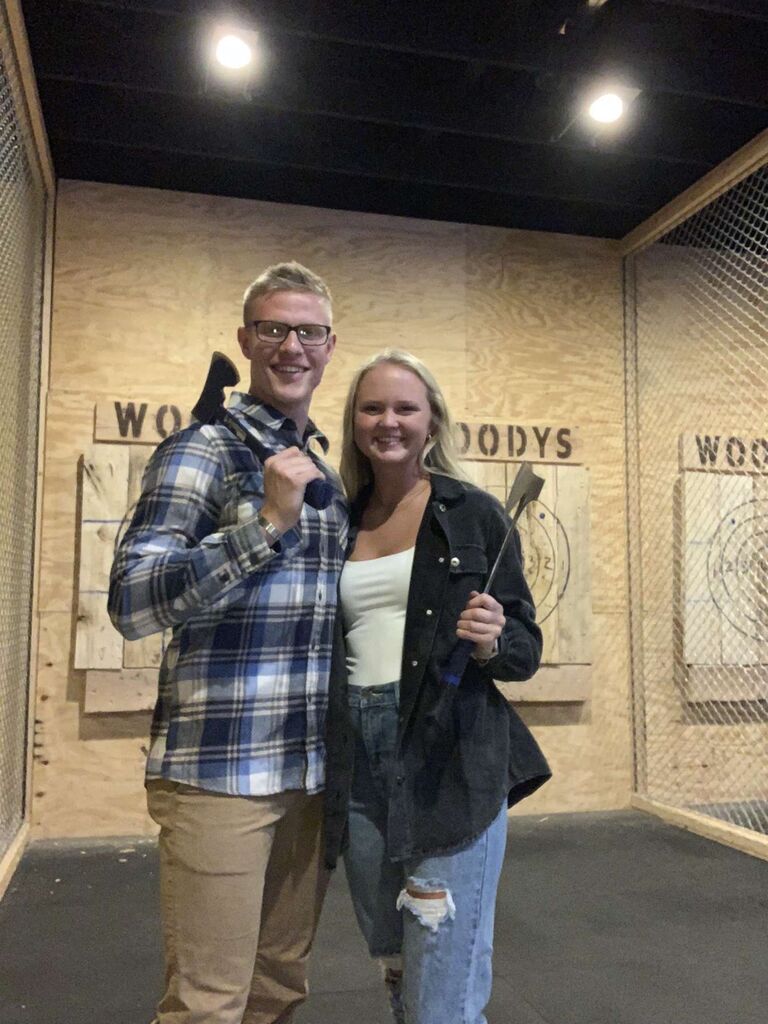 Reid and I met through mutual friends, Gage and Louisa. For a few months, we kept running into each other Sunday nights at our college ministry, Oasis. When Reid asked me out on our first date, the only information he gave me was to "wear close toed shoes." We ended up going to dinner followed by axe throwing! One week later, he asked me to be his girlfriend.