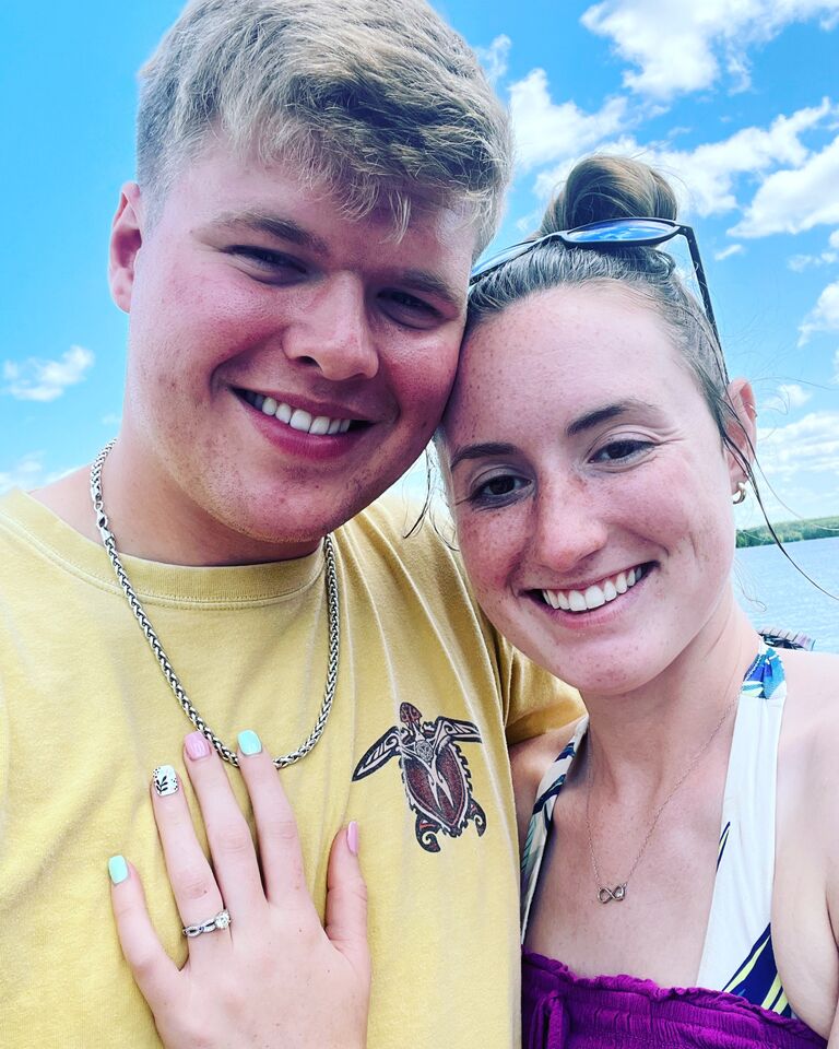 Brady proposed! He took me out on an early morning fishing trip and asked me to put the trolling motor in. When I turned around he was on one knee, I said YES!