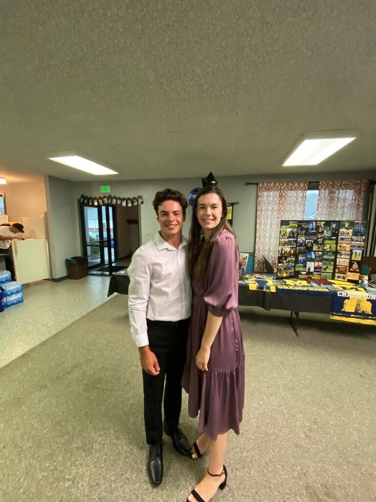 Us attending our first wedding together. We had also helped with his brother's graduation party. 
