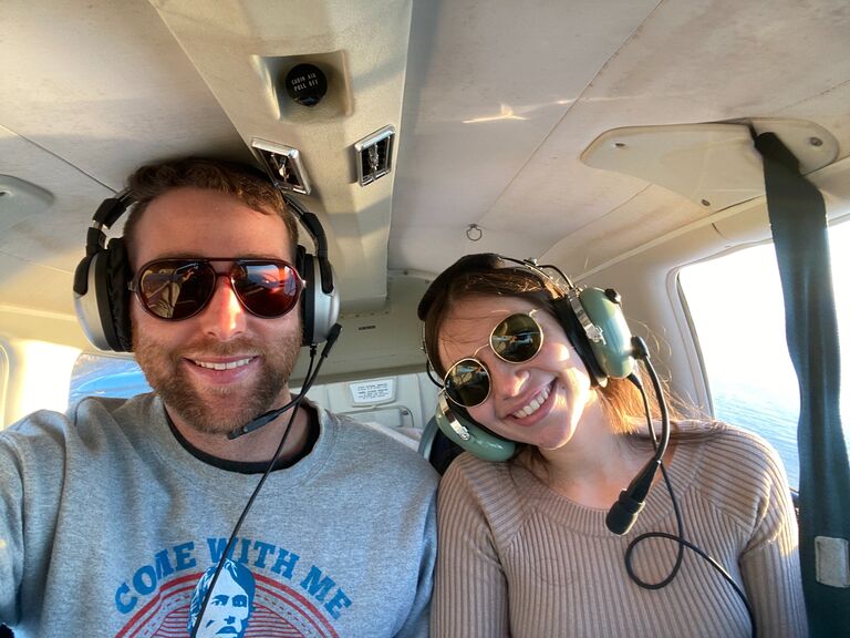 Jason surprised Sharon with a private plane ride to celebrate 6 months together not knowing that Sharon was afraid of heights.  The sunglasses hide the fear in her eyes.