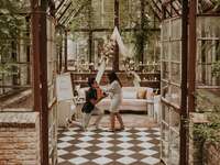 couple getting engaged in a beautiful indoor garden