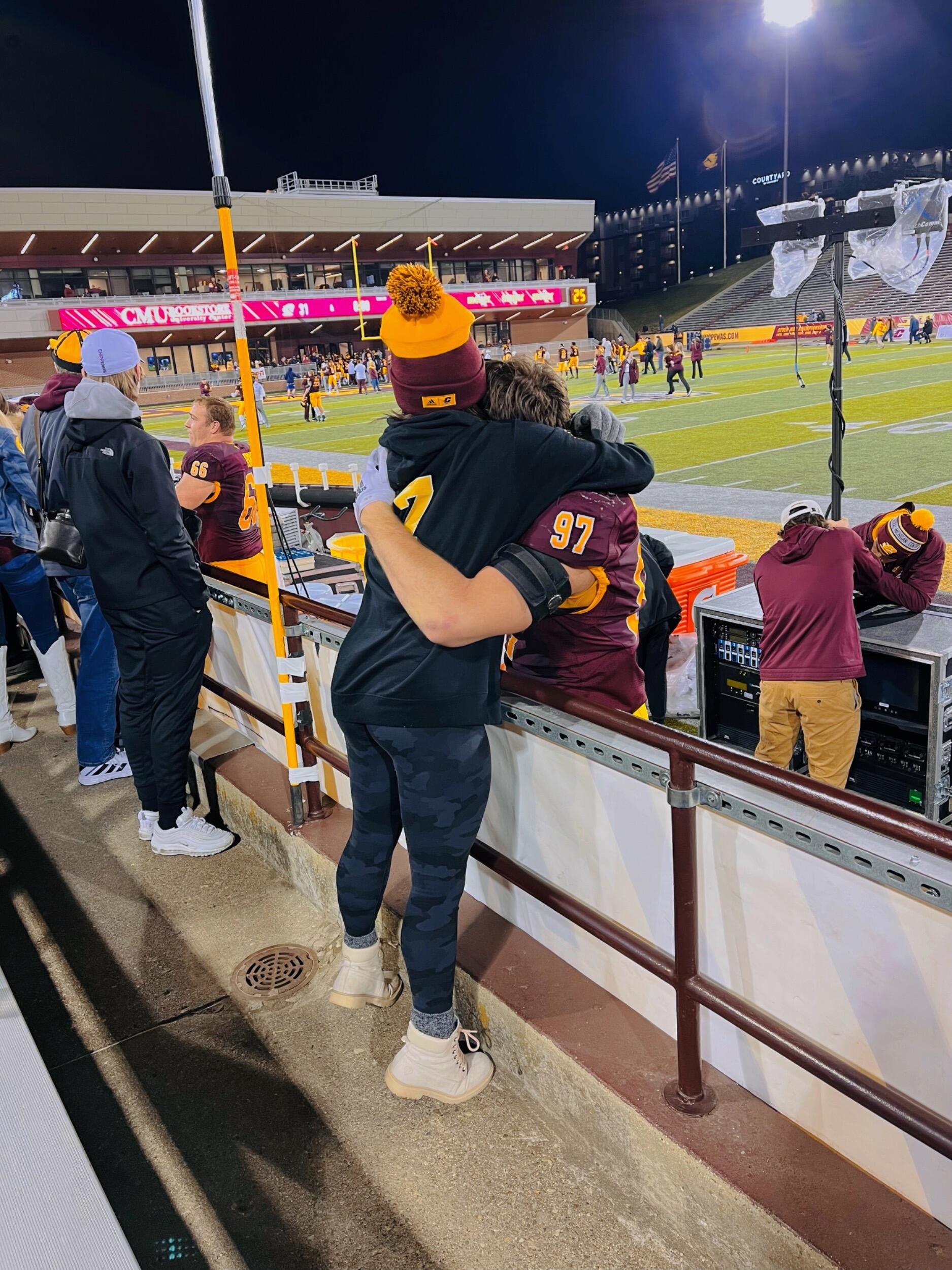 • First football game as a couple •