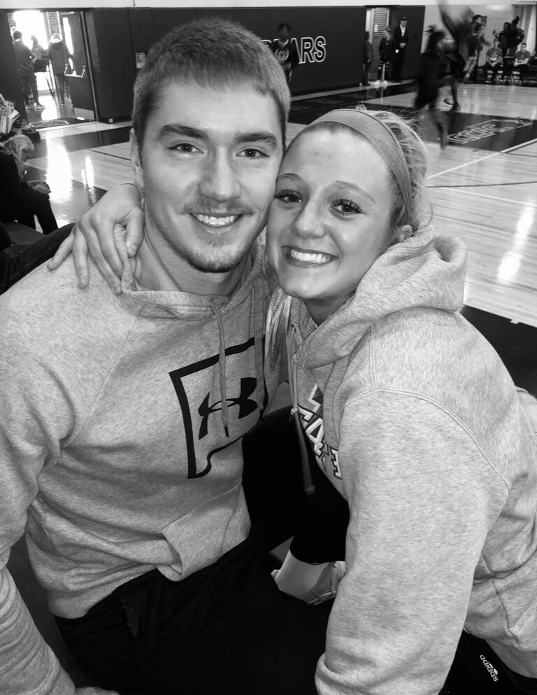 Jake watching Katie play basketball at DMACC