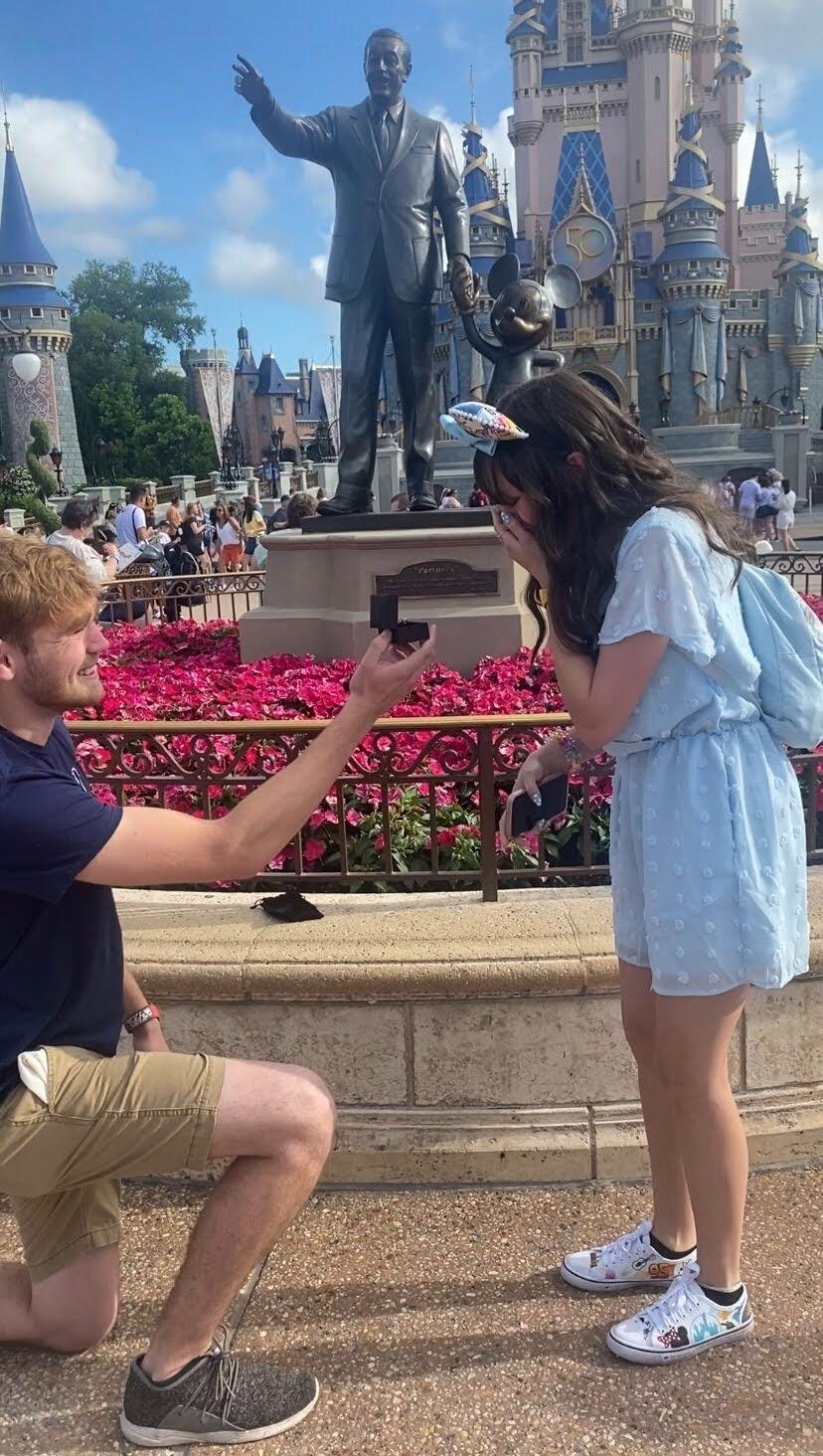 Haydn proposed to Holly in front of Cindrella's Castle at Walt Disney World in Orlando, Florida on June 1st, 2022.