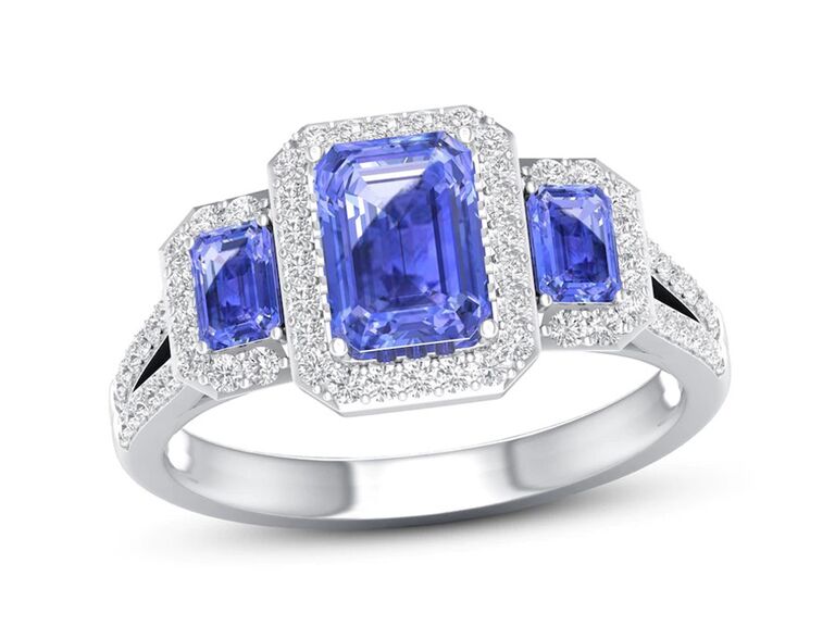 kay three-stone emerald cut tanzanite engagement ring with double emerald shaped round diamond halo and double round diamond sides